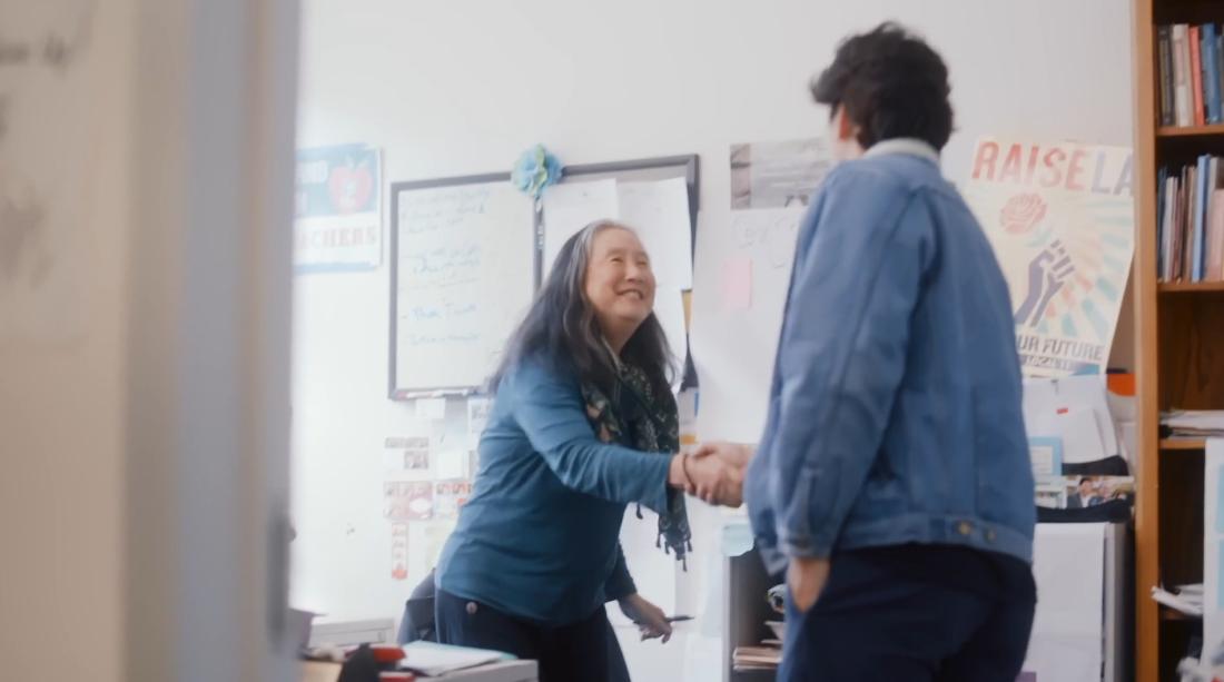 Two people shaking hands